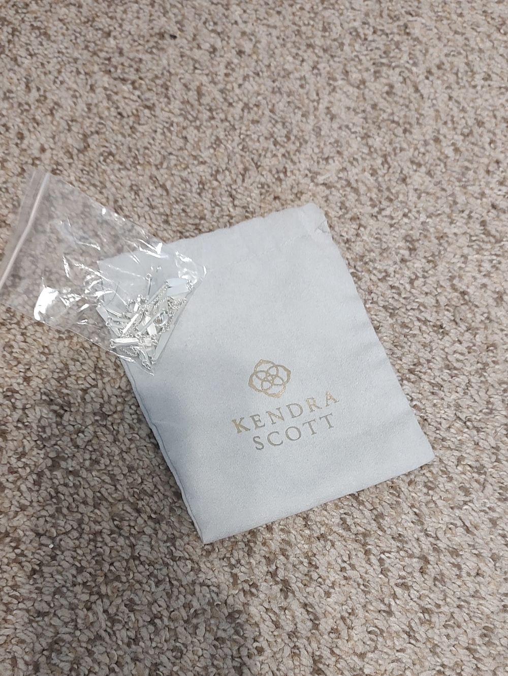 Kendra Scott Light Gray Necklace With Jewelry Pouch with Gold Logo
